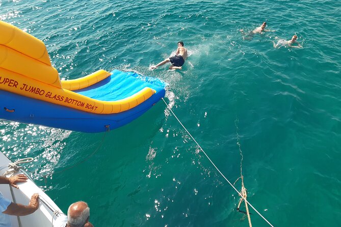 2.5 hour Glass Bottom Boat Trip, Snorkeling, Sliding and Fun - The Super Jumbo Slide changes the mood