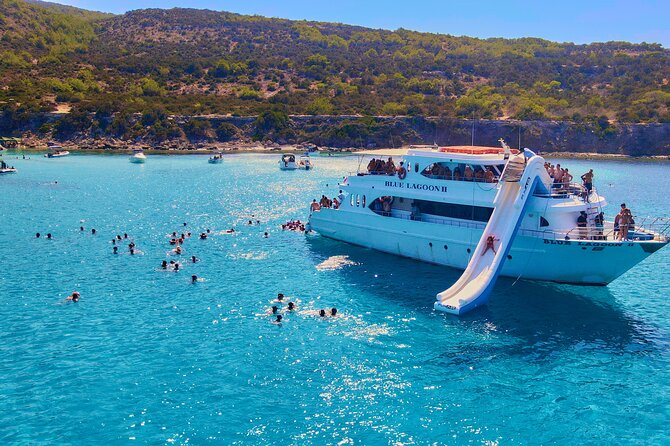 Blue Lagoon (Akamas) Bus & Boat Tour with Water Slide From Paphos - Manolis Bay and the view toward St. George