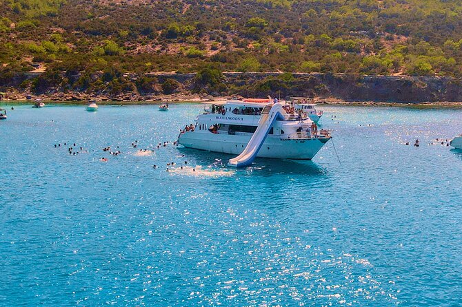 Blue Lagoon (Akamas) Bus & Boat Tour with Water Slide From Paphos - Crowd levels and using the swimming stairs