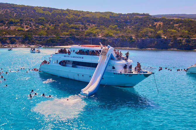 Blue Lagoon (Akamas) Bus & Boat Tour with Water Slide From Paphos - Food, drinks, and the cruise back