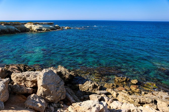 Blue Lagoon and Aphrodite's Baths Guided Day Tour from Paphos - Swimming in the Blue Lagoon