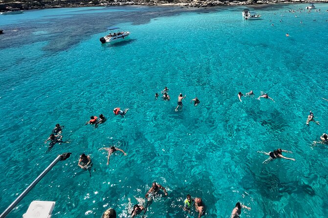 Blue Lagoon cruise: giant slide, music & Paphos hotel transfers - The Paphos to Latchi coach ride