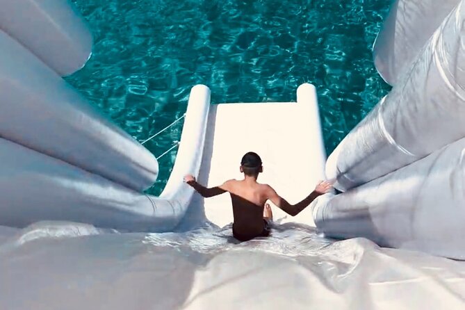 Blue Lagoon cruise: giant slide, music & Paphos hotel transfers - Baths of Aphrodite and the Akamas coast