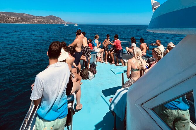 Blue Lagoon cruise: giant slide, music & Paphos hotel transfers - Manolis Bay and the story of Manolis Cave