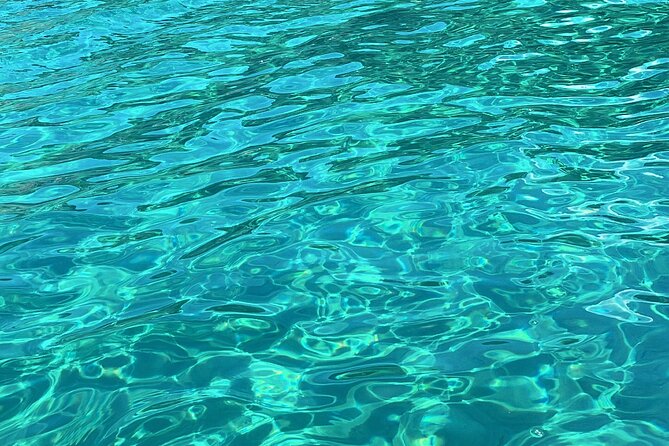 Blue Lagoon cruise: giant slide, music & Paphos hotel transfers - Fontana Amorosa and the romantic side of the route