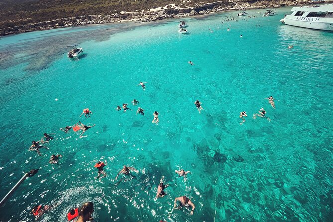Blue Lagoon trip with slide & music departing from Latchi harbour - Music, the slide, and the mood onboard
