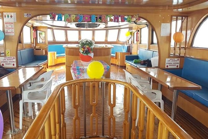 Demetris Chara Boat/Blue Lagoon boat trips with BBQ and SLIDE - The bar, slide, and family appeal