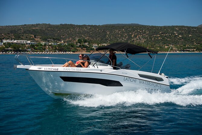 Karnic SL702 boat with driver, WC,Cabin, BT music and shower - Taking the controls from Latchi Harbour