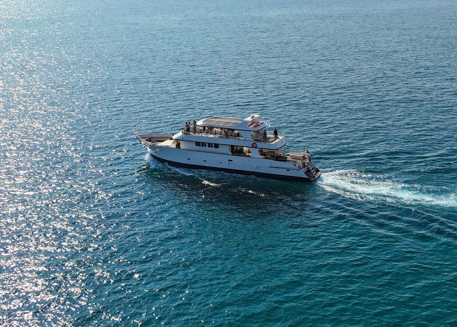 Larnaca: Glass-Bottom Boat Cruise with Fishing and BBQ Lunch - Swimming in the clear Mediterranean water