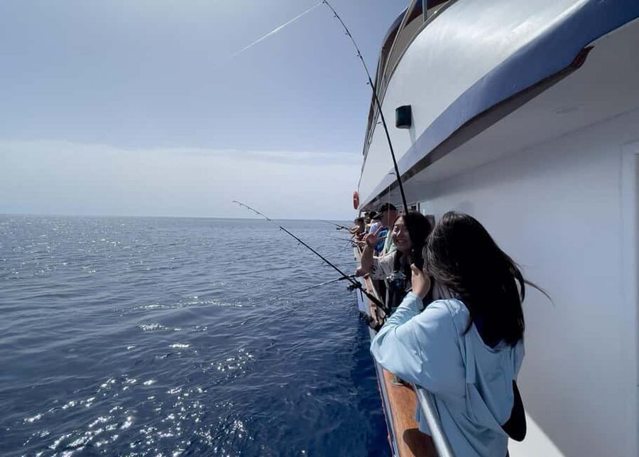 Larnaca: Glass-Bottom Boat Cruise with Fishing and BBQ Lunch - Watching planes pass above Larnaca’s coast