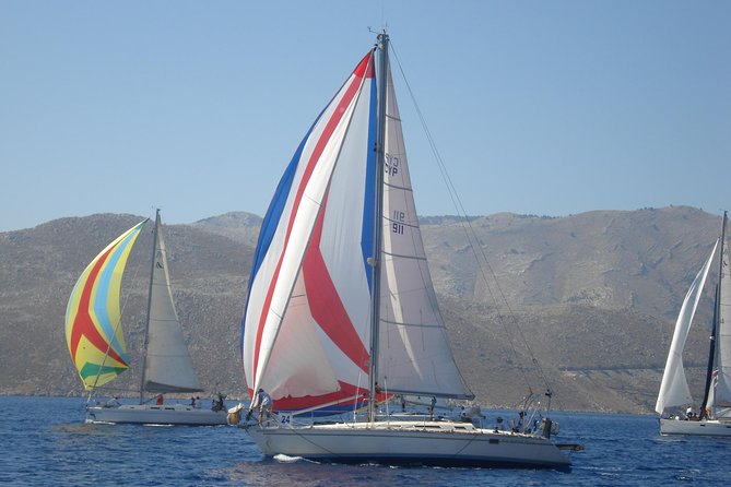 Private cruise with a sailing yacht Koursaros - A turn at the helm with the skipper nearby