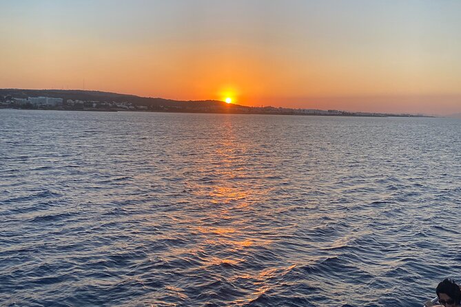 Sunset Boat Trip to Cape Greco and Blue Lagoon - Cape Greco’s cliffs, chapel, and natural arch